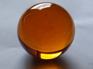 Crystal glass sphere orange | amber